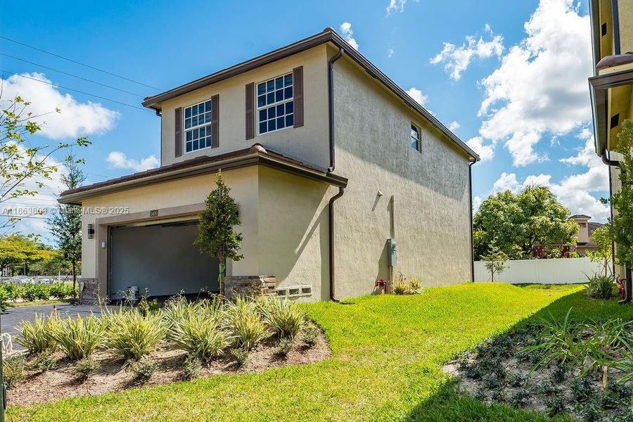 Front exterior of a new home in , Tamarac, FL, highlighting curb appeal (Image 2).