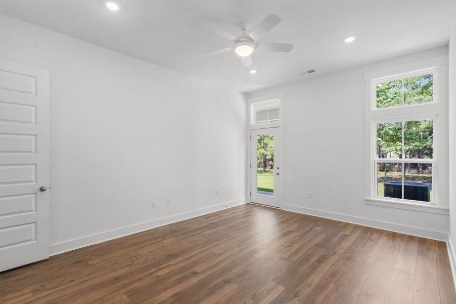 Spacious, unfurnished interior of a new home in Long Bay Golf Club, Longs (Image 28).