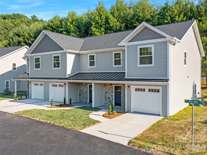 Front exterior of a new home in , Burnsville, NC, highlighting curb appeal (Image 28).