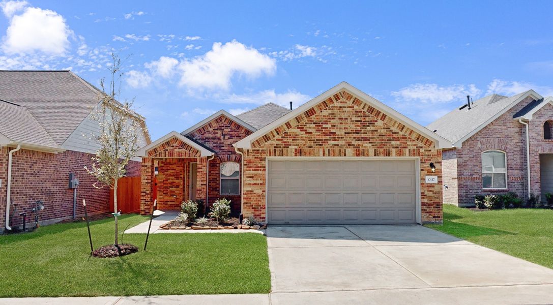 Representative exterior photo of a completed home built from the Floor Plan 1605 by Colina Homes in River Ranch, Dayton, TX (Image 21).