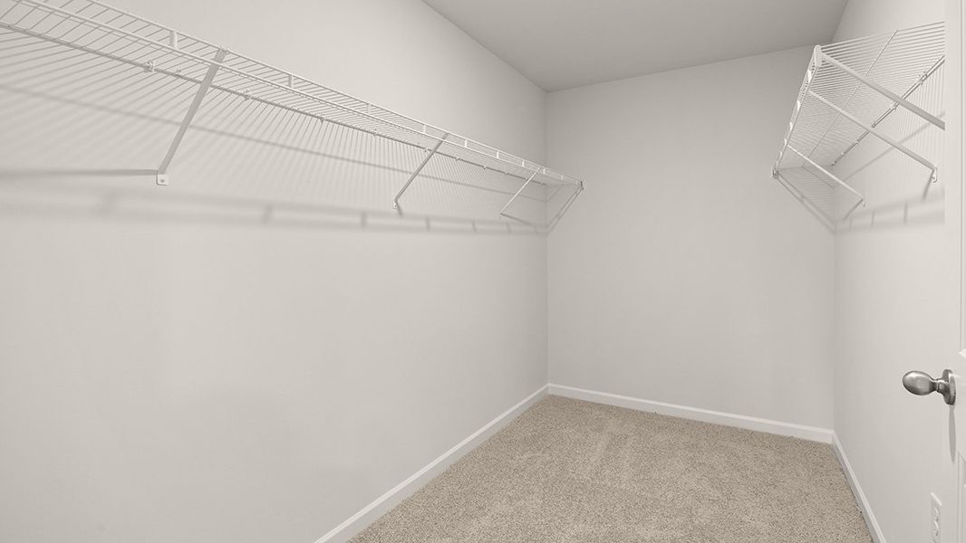 Representative unfurnished interior of a home built from the Mansfield by D.R. Horton in Liberty Crossing, Braselton (Image 28).