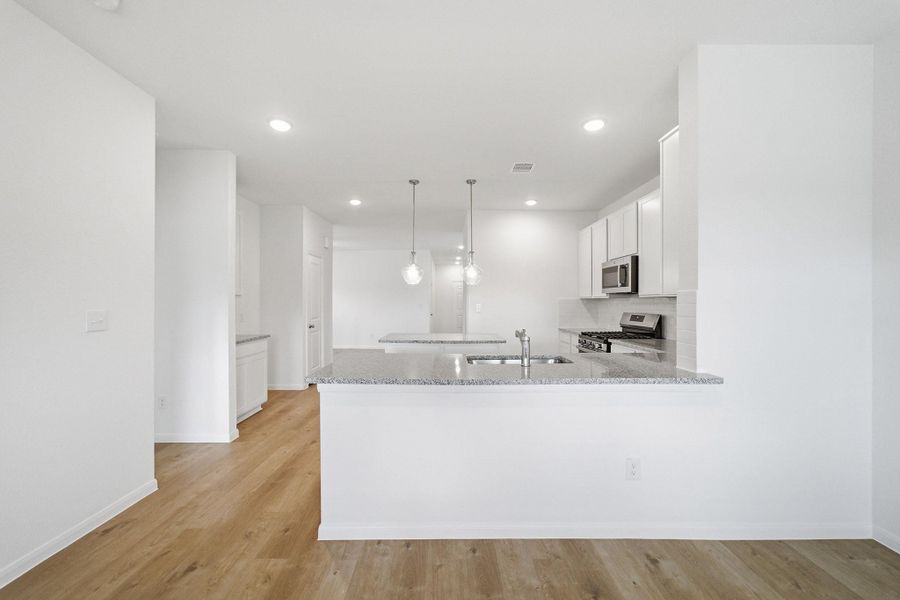 Furnished interior view inside a new home in , Conroe (Image 7).