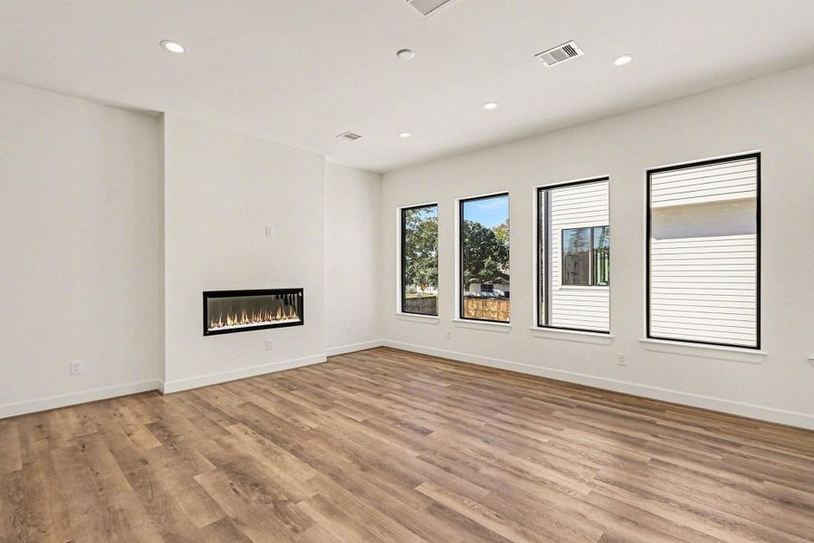 Gorgeous luxury plank hardwood flooring throughout and big windows for great natural light.
