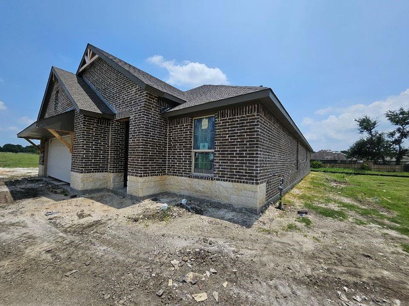 In-progress construction of a new home in The Hollow, Ennis, TX (Image 8).