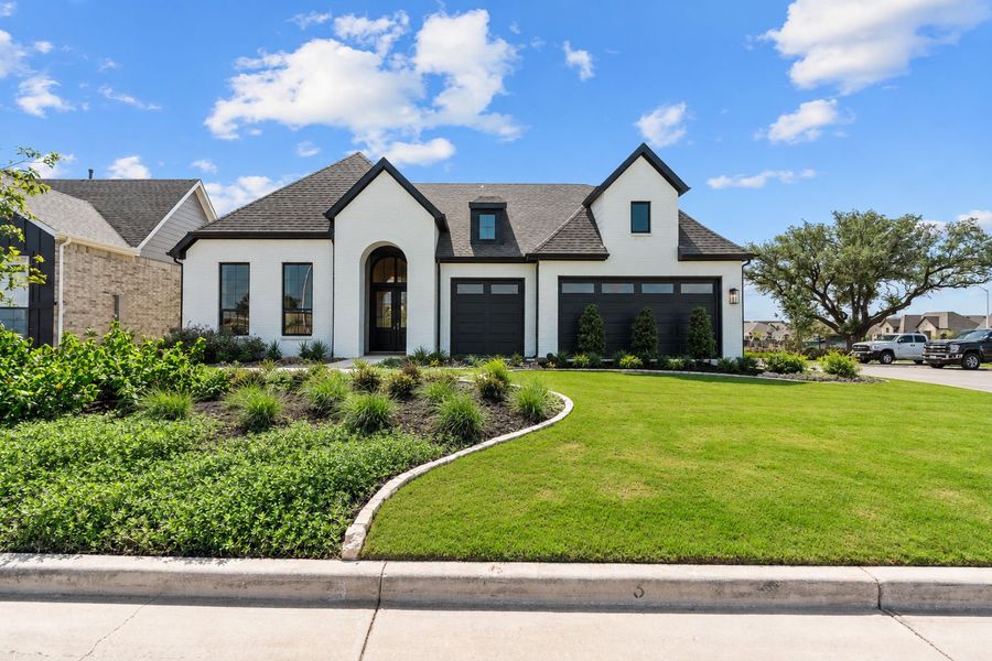 Representative exterior photo of a completed home built from the Renown by Del Webb in Del Webb New Braunfels at Veramendi, New Braunfels, TX (Image 23).