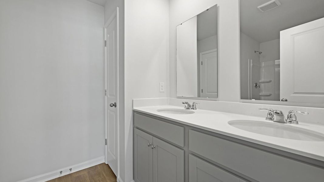 Representative furnished interior of a home built from the DENMARK by D.R. Horton in Pine Hills Townhomes at Cane Bay, Summerville (Image 12).