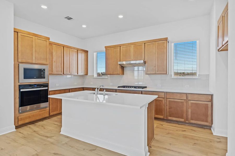 Furnished interior view inside a new home in The Colony - 50', Bastrop (Image 11).