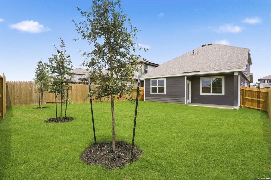 Exterior details and patio area of a home in Timber Creek, San Antonio (Image 3).