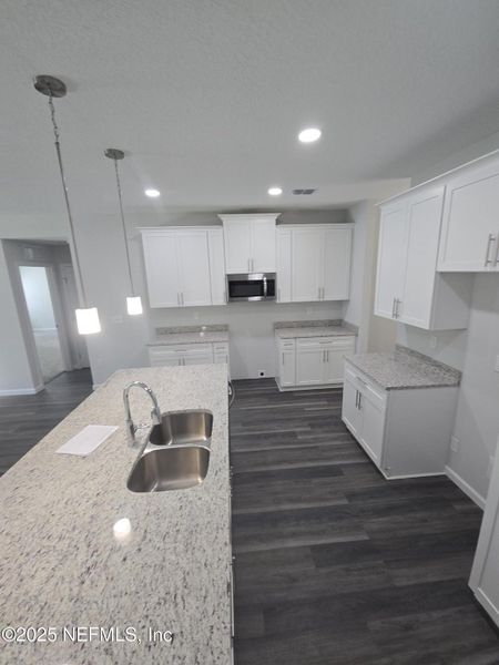 Furnished interior view inside a new home in , Jacksonville (Image 20).