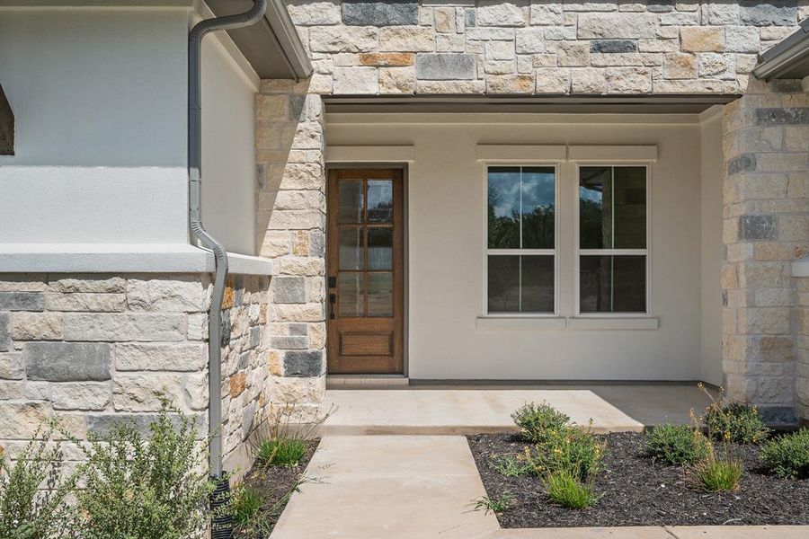 Exterior details and patio area of a home in Lariat, Liberty Hill (Image 3).
