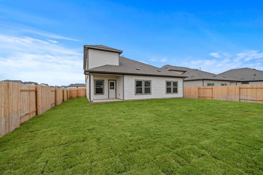 Rear of Home and Private Backyard