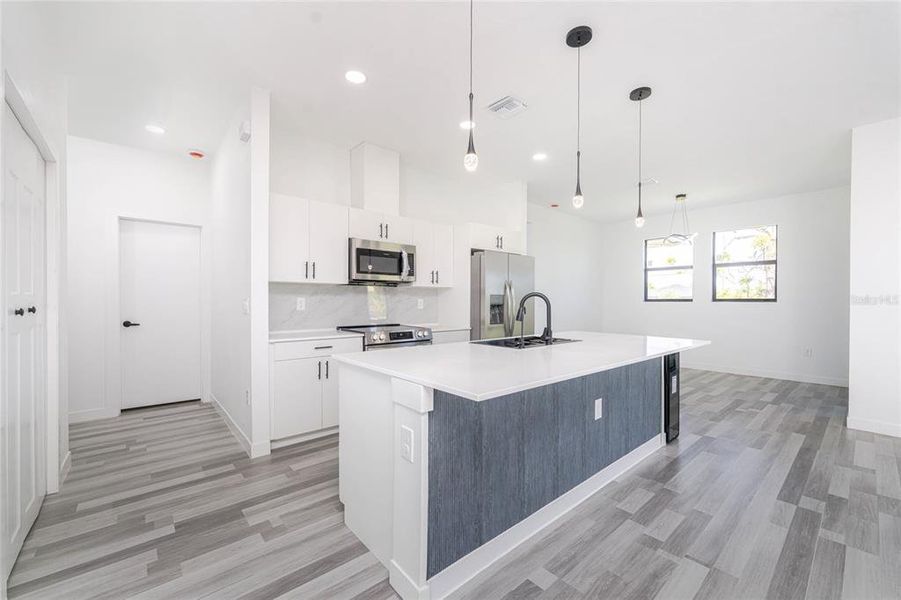 Furnished interior view inside a new home in , Port Charlotte (Image 9).