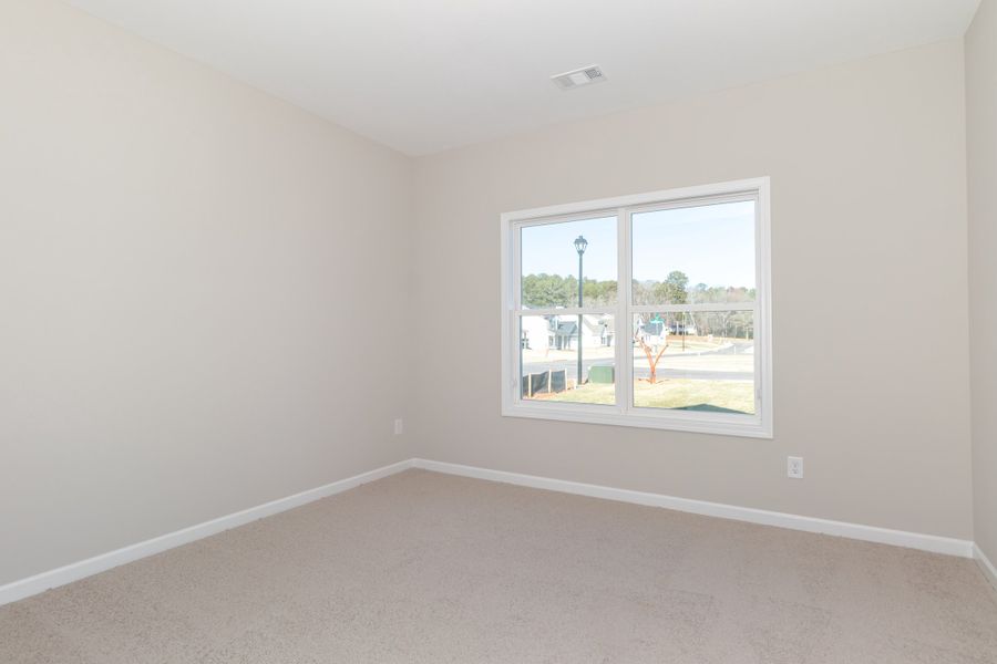 Spacious, unfurnished interior of a new home in Standing Oaks, Senoia (Image 25).