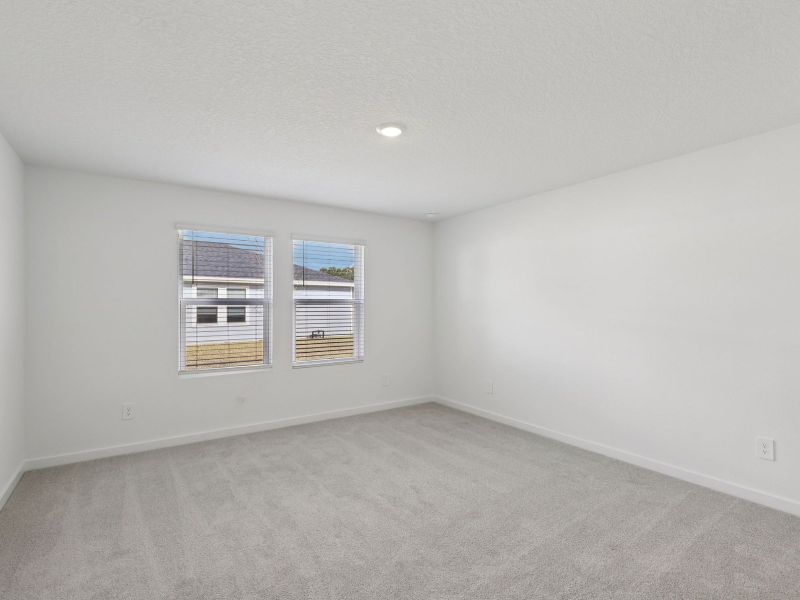 Spacious, unfurnished interior of a new home in Flagler Village - Classic Series, Palm Coast (Image 12).