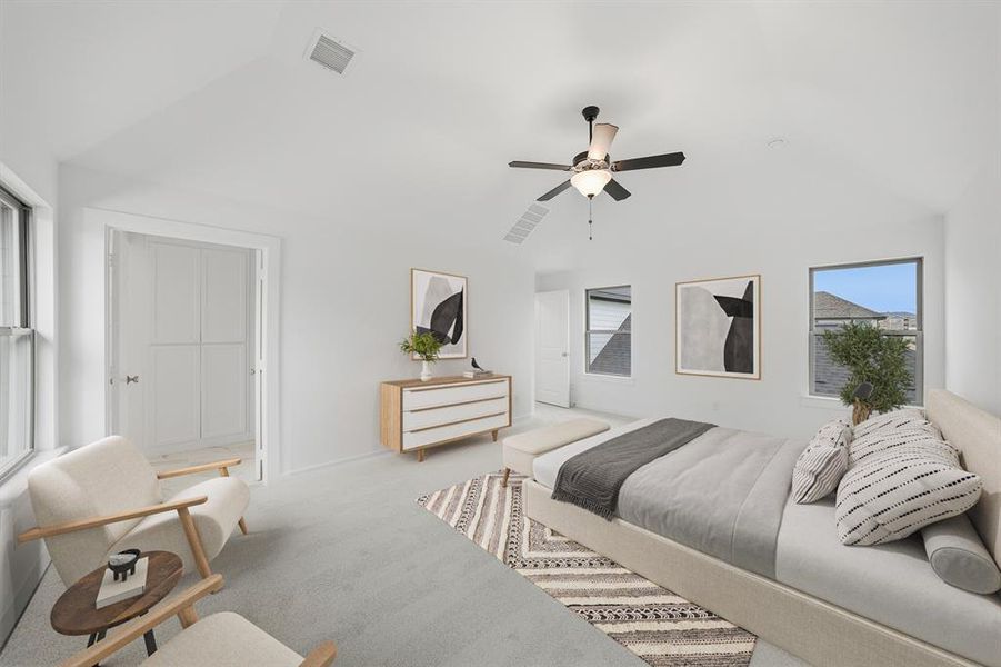 Bedroom featuring lofted ceiling, carpet, and a ceiling fan
