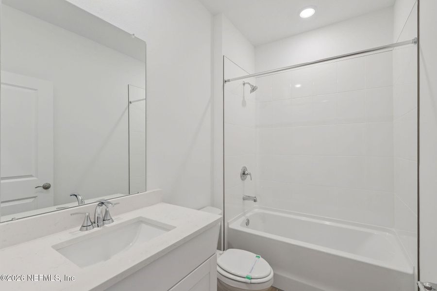 Furnished interior view inside a new home in Colbert Landings, Palm Coast (Image 11).