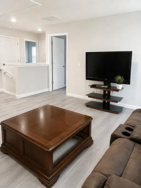 Furnished interior view inside a new home in Pine Hills at Cane Bay, Summerville (Image 6).
