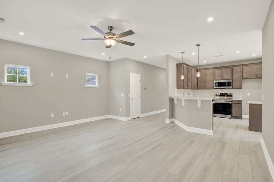 Aspen Plan Great Room and Central Hallway