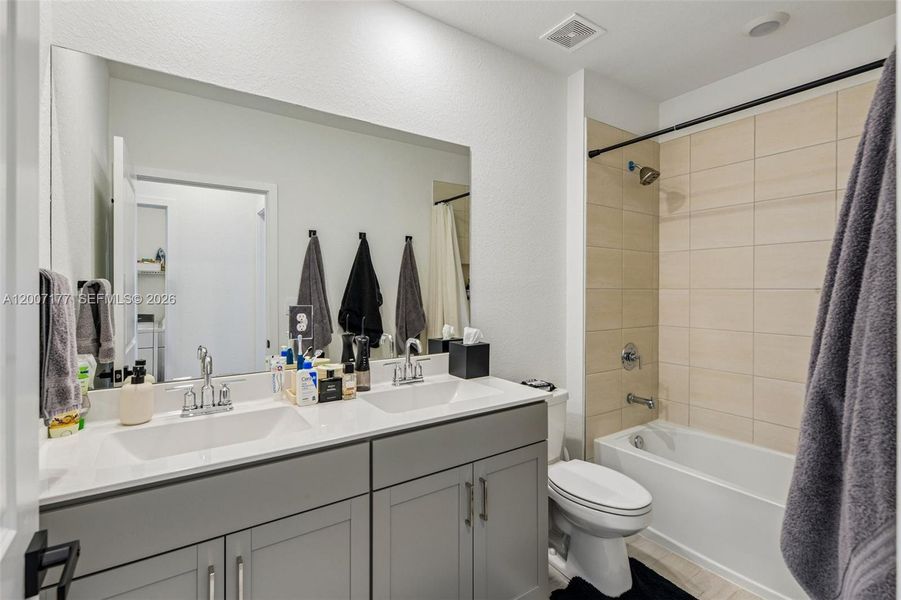 Furnished interior view inside a new home in Messina Place, Homestead (Image 31).