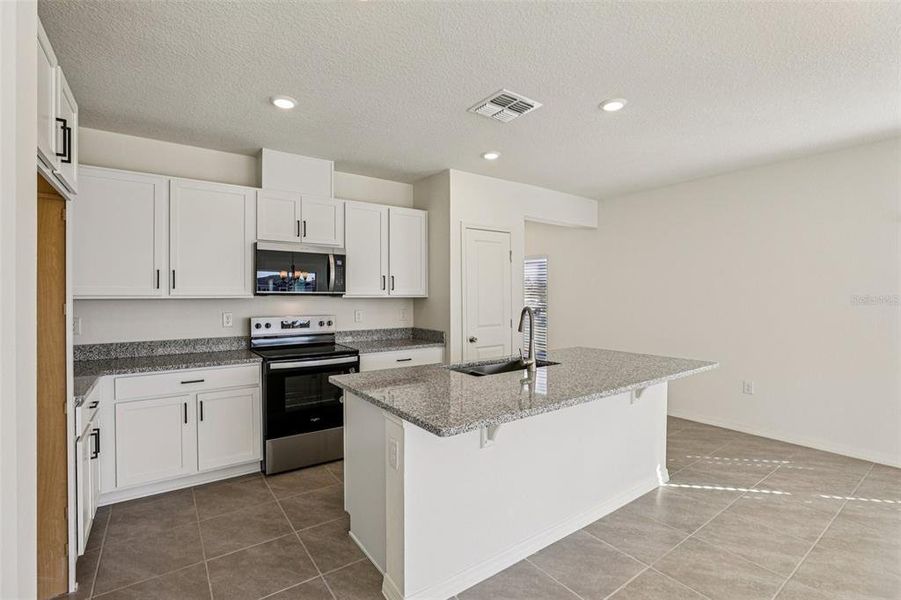 Furnished interior view inside a new home in , Lake Wales (Image 5).