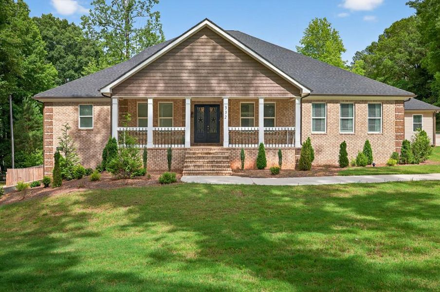 Front exterior of a new home in , Oxford, GA, highlighting curb appeal (Image 24).