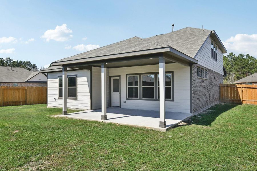 Exterior details and patio area of a home in Splendora Fields, Splendora (Image 25).