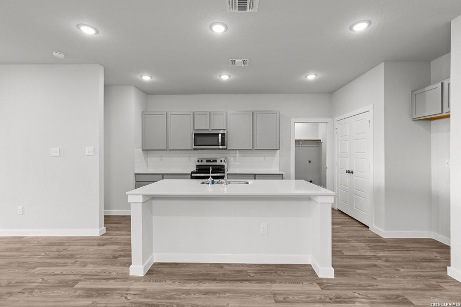 Furnished interior view inside a new home in Hacienda, San Antonio (Image 10).