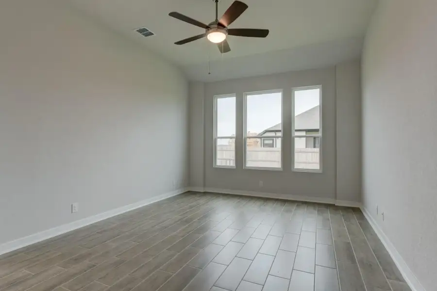 Representative unfurnished interior of a home built from the Guadalupe by Ashton Woods in Saddlebrook Ranch, Schertz (Image 24).