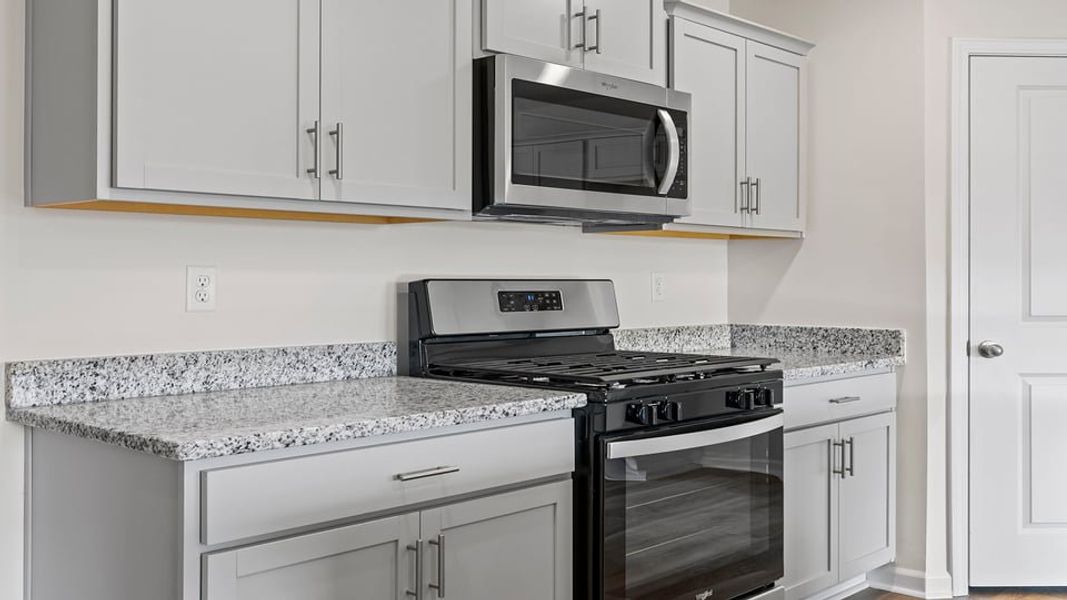 Furnished interior view inside a new home in Lakestone, Woodruff (Image 10).