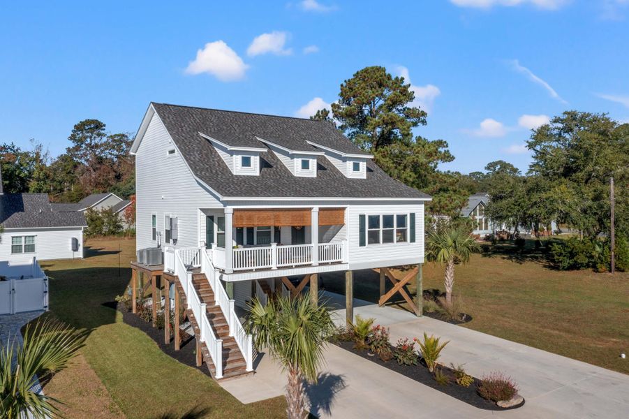 Front exterior of a new home in , Georgetown, SC, highlighting curb appeal (Image 24).