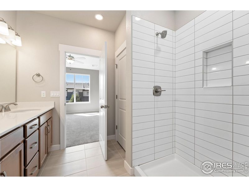 Furnished interior view inside a new home in The Lakes at Centerra - Discovery, Loveland (Image 13).