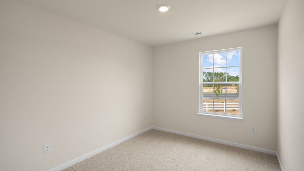 Spacious, unfurnished interior of a new home in Clock Road Townhomes, New Bern (Image 24). Spacious, unfurnished interior of a new home in Clock Road Townhomes, New Bern (Image 24).