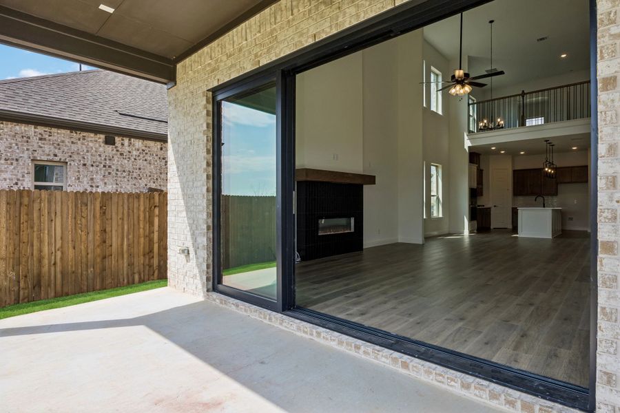 Exterior details and patio area of a home in Country Lakes, Denton (Image 3).