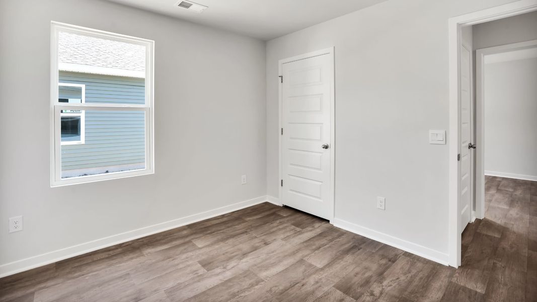 Spacious, unfurnished interior of a new home in Lockwood Landing, Supply (Image 26).