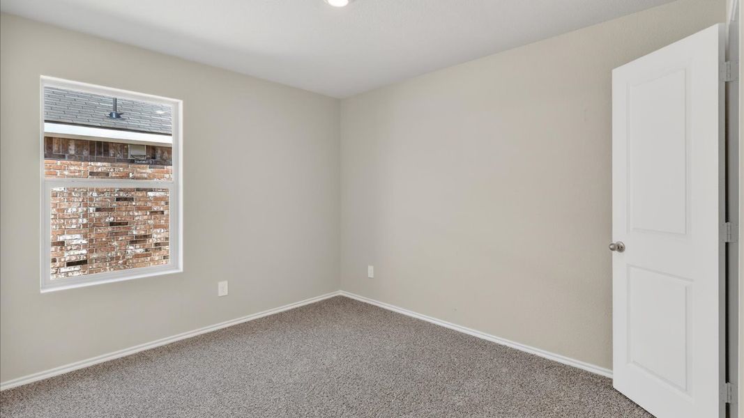 Representative unfurnished interior of a home built from the Abbot by D.R. Horton in Hickory Grove, Krum (Image 13).