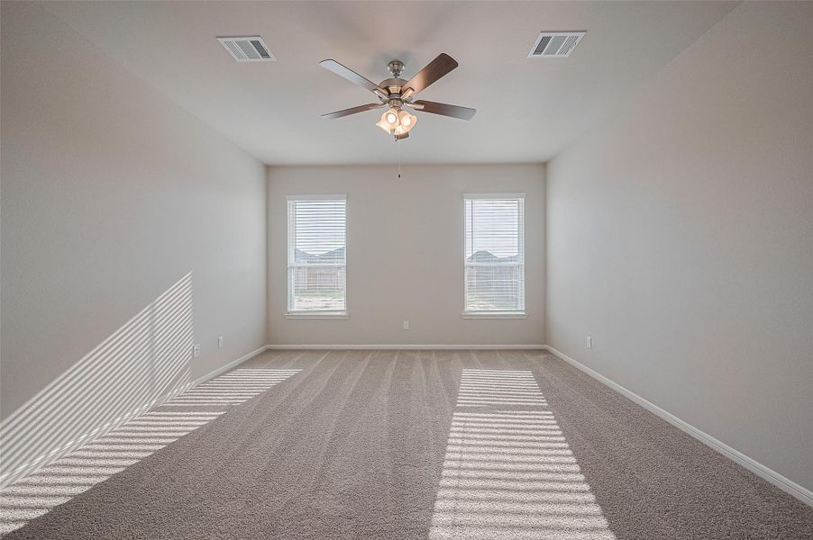 Spacious, unfurnished interior of a new home in Sunterra, Katy (Image 16).