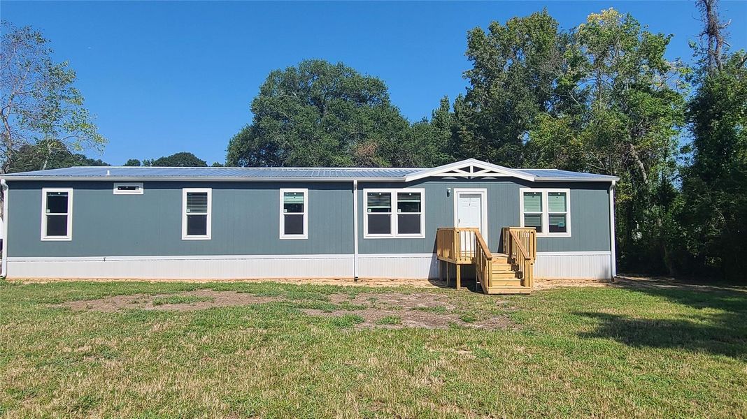 Front exterior of a new home in , Cleveland, TX, highlighting curb appeal (Image 1). Front exterior of a new home in , Cleveland, TX, highlighting curb appeal (Image 1).