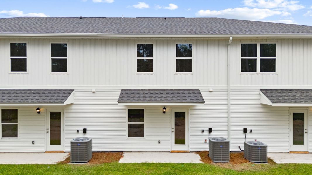 Exterior details and patio area of a home in Chateau Nemours, Port Saint Joe (Image 4). Exterior details and patio area of a home in Chateau Nemours, Port Saint Joe (Image 4).