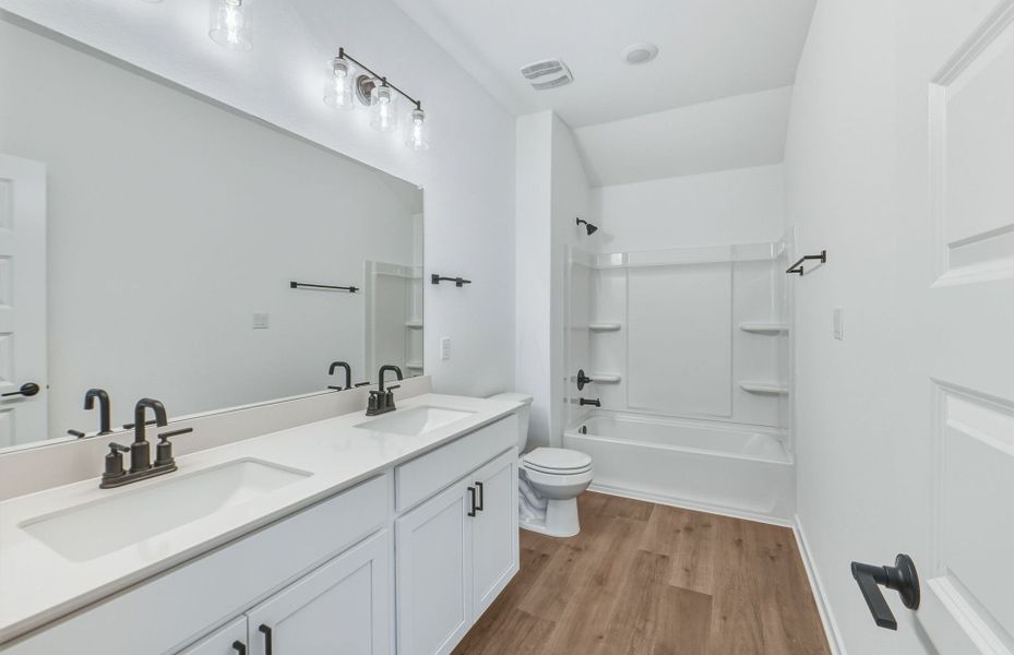 Furnished interior view inside a new home in Sunfield, Buda (Image 8).