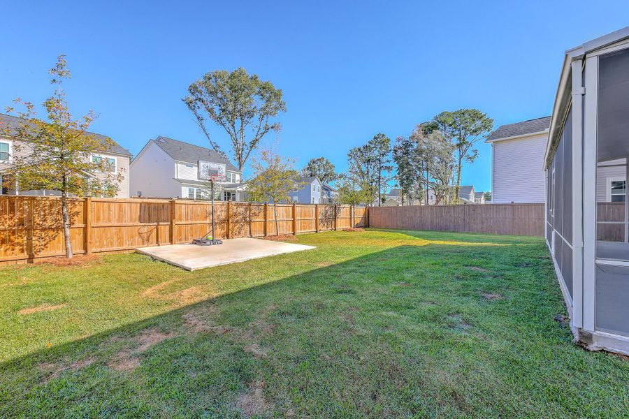 Exterior details and patio area of a home in Limehouse Village: Arbor Series, Summerville (Image 2). Exterior details and patio area of a home in Limehouse Village: Arbor Series, Summerville (Image 2).