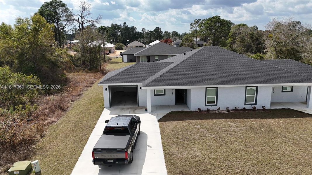 Front exterior of a new home in , Sebring, FL, highlighting curb appeal (Image 22).