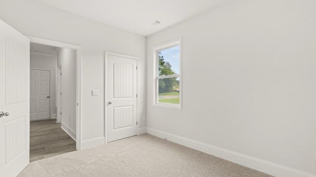 Spacious, unfurnished interior of a new home in Haven Abbey, Cumming (Image 29).