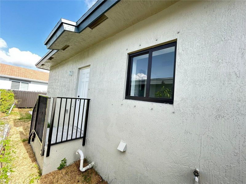 Exterior details and patio area of a home in , Miami (Image 4). Exterior details and patio area of a home in , Miami (Image 4).