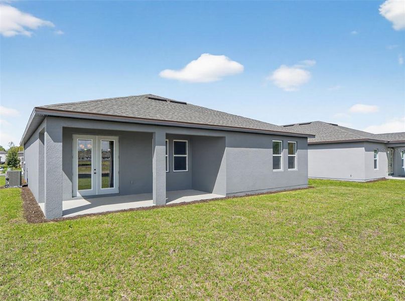 Exterior details and patio area of a home in Tyson Reserve, St. Cloud (Image 4).