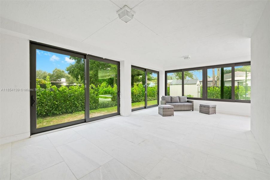 Furnished interior view inside a new home in , Miami Springs (Image 28).
