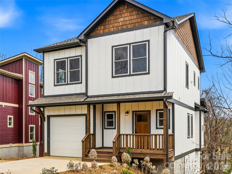 Front exterior of a new home in , Asheville, NC, highlighting curb appeal (Image 28).