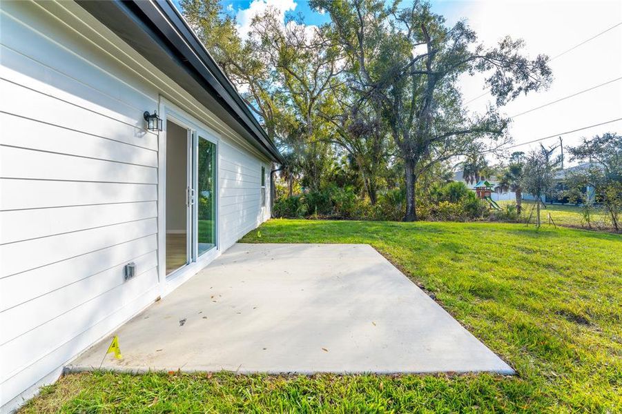 Exterior details and patio area of a home in , North Port (Image 28).