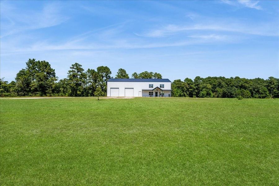 Front exterior of a new home in , Diboll, TX, highlighting curb appeal (Image 22). Front exterior of a new home in , Diboll, TX, highlighting curb appeal (Image 22).