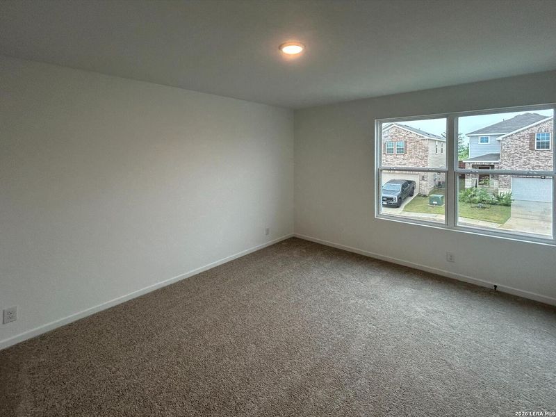 Spacious, unfurnished interior of a new home in Hennersby Hollow, San Antonio (Image 23).