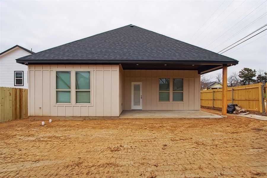 Rear view of house with a patio